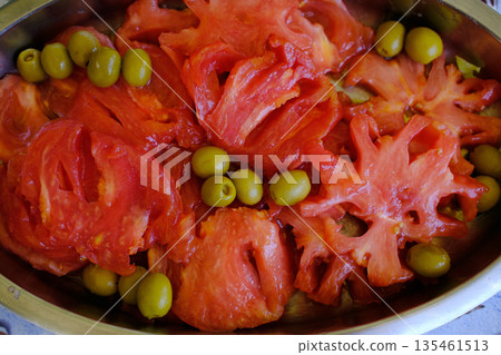 Red raw tomatoes served fresh as natural and healthy food. Red raw tomatoes served fresh as natural and healthy food. 135461513