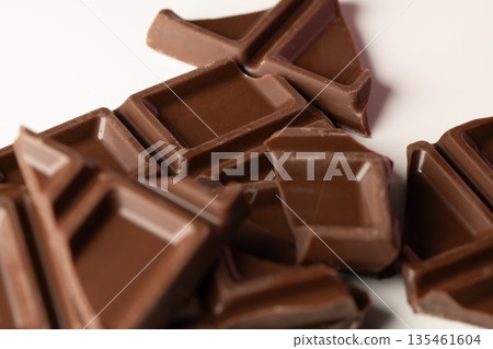 Valentine's Day and sweets background material: broken milk chocolate Valentine's Day and sweets background material: broken milk chocolate 135461604