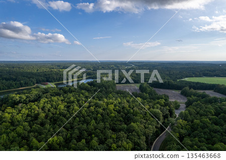 A lush green forest with a river running through it. Richmond, USA 135463668
