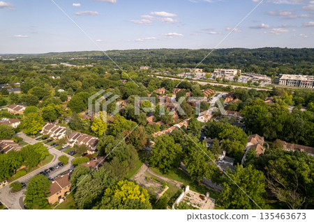 A view of a residential neighborhood with houses and trees. Chesterbrook, USA 135463673