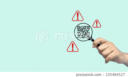 Hand holding a magnifying glass inspecting a QR code surrounded by red warning alert signs. Concept of quishing, cybersecurity, online fraud prevention, and scanning for malicious links Hand holding a magnifying glass inspecting a QR code surrounded by red warning alert signs. Concept of quishing, cybersecurity, online fraud prevention, and scanning for malicious links 135464527