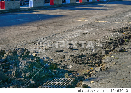 Repairing.Removing old road surfaces before laying new asphalt Repairing.Removing old road surfaces before laying new asphalt 135465040