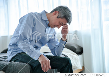 Senior man worried Senior man worried 135465230
