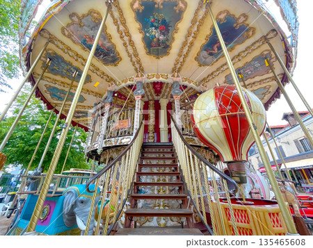 Merry-go-round in a square in Rambouillet, France Merry-go-round in a square in Rambouillet, France 135465608