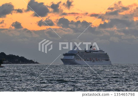 Evening view of a cruise ship passing through the Akashi Strait Evening view of a cruise ship passing through the Akashi Strait 135465798