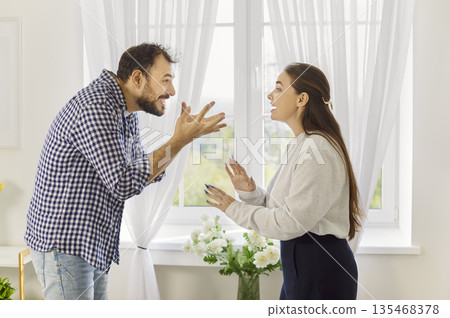 Relationship dispute of angry couple, disagreement of people shouting with anger 135468378