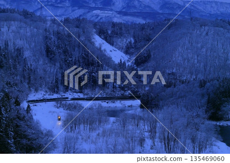 Snow-covered Iiyama Line 135469060
