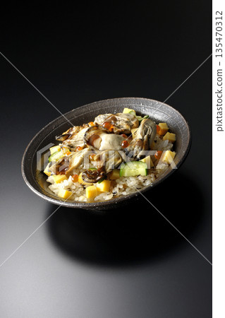 Oyster chirashi sushi photographed against a black background Oyster chirashi sushi photographed against a black background 135470312