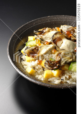 Oyster chirashi sushi photographed against a black background 135470319