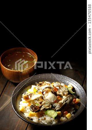 Oyster chirashi sushi and clear soup 135470588