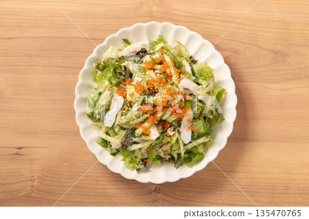 Japanese salad (tuna, kamaboko, flying fish roe, lettuce, cucumber) Japanese salad (tuna, kamaboko, flying fish roe, lettuce, cucumber) 135470765