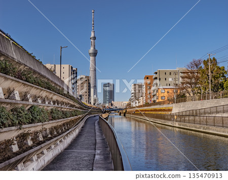 Kitajukkengawa River promenade and river surface with a view of Tokyo Skytree (Koto Ward and Sumida Ward, Tokyo) Kitajukkengawa River promenade and river surface with a view of Tokyo Skytree (Koto Ward and Sumida Ward, Tokyo) 135470913