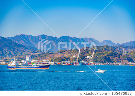 (Shizuoka Prefecture) Ships passing by at Shimizu Port under clear skies (Shizuoka Prefecture) Ships passing by at Shimizu Port under clear skies 135470932