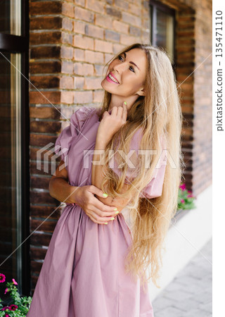 Stylish Woman In Pink Dress Outdoors 135471110