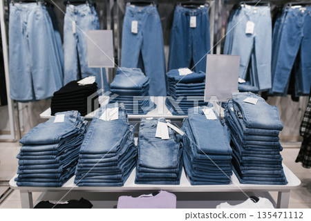 Full Frame View of Modern Retail Display Featuring Denim and Bla 135471112