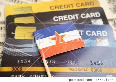 Yugoslavia flag on credit card, finance economy trading shopping online business. 135471472