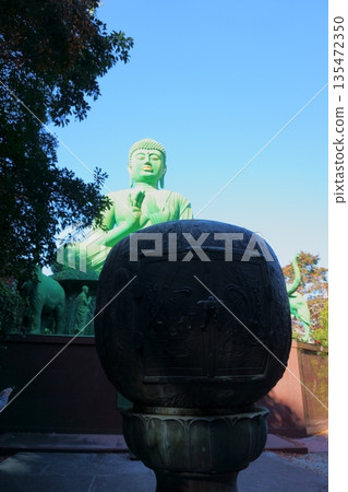 Togonji Temple: Green Buddha and incense burner 135472350
