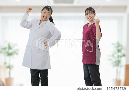 Medical team pumping their fist in excitement Medical team pumping their fist in excitement 135472789