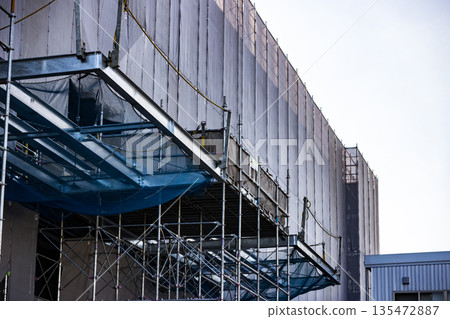 Construction site scaffolding fall prevention measures Construction site scaffolding fall prevention measures 135472887