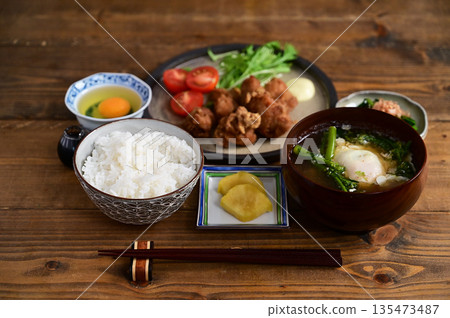 One soup and two dishes: fried chicken and spinach One soup and two dishes: fried chicken and spinach 135473487