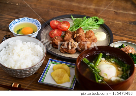 One soup and two dishes: fried chicken and spinach One soup and two dishes: fried chicken and spinach 135473493