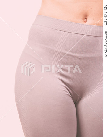 Sport fit woman in thermal clothes. Sport fit woman in thermal clothes. 135475426