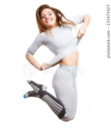 Fit female wearing thermoactive underwear Fit female wearing thermoactive underwear 135475427
