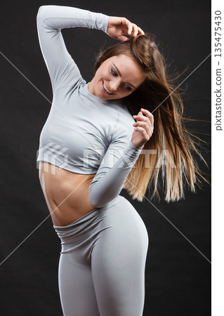 Sport fit woman in thermal clothes. Sport fit woman in thermal clothes. 135475430