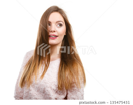 Portrait of happy attractive woman wearing light jumper 135475431
