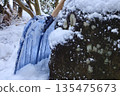 Garden stones and a blue snow shovel 135475673