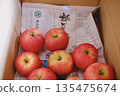Apples in a cardboard box 135475674