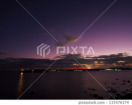 View of the sunset over Cape Anorizaki from Sugasaki Park in early winter 135476374
