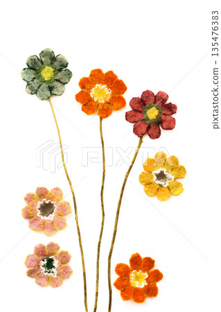 Seven colors of felted wool on a white background Seven colors of felted wool on a white background 135476383