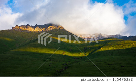 Majestic mountains and rocky terrain in serene nature 135476388