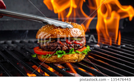 Grilled Burger Cooking on Flaming Barbecue Grilled Burger Cooking on Flaming Barbecue 135476443