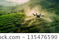 Agriculture drone fly to sprayed fertilizer on farm. 135476590