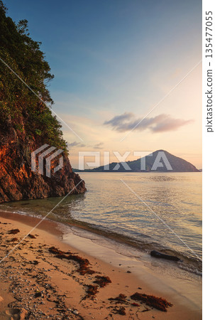 Beach on an uninhabited island at sunset, Philippines. 135477055