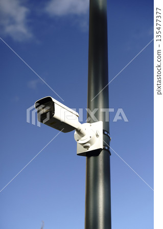 Surveillance Camera on Street Pole for Urban Security and Monitoring Surveillance Camera on Street Pole for Urban Security and Monitoring 135477377