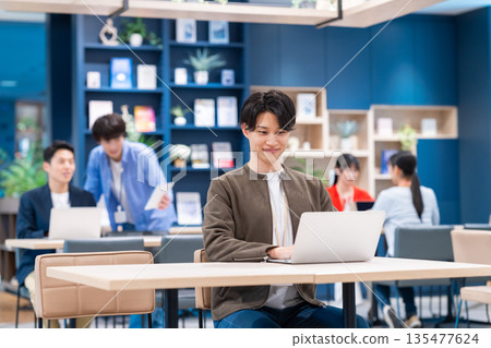 Young engineer working in the office 135477624