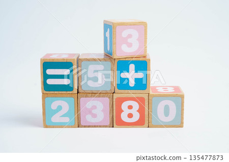 Number wood block cubes for learning Mathematic, education math concept. 135477873