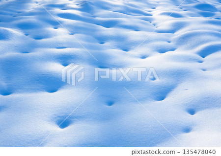 Winter holiday background with blue snow textures 135478040