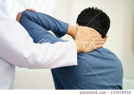 Physical therapy, Asian therapist doctor treat perform pain therapy in hospital. Physical therapy, Asian therapist doctor treat perform pain therapy in hospital. 135478438