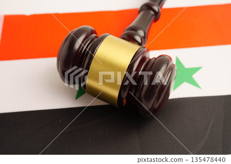 Syrian law, Legal, justice and agreement, wooden court gavel on flag. Syrian law, Legal, justice and agreement, wooden court gavel on flag. 135478440