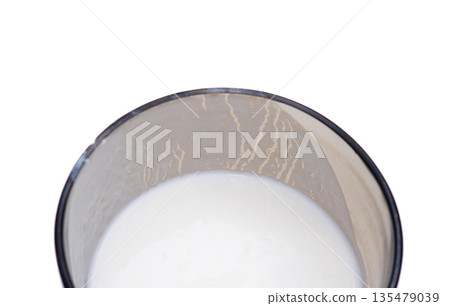 A cup of drunk kefir. 135479039