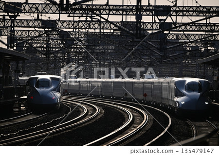 Shinkansen trains entering and departing from the station Shinkansen trains entering and departing from the station 135479147