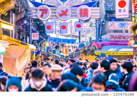 Tokyo cityscape in Japan on January 1st. Inbound tourism continues... It's like a "foreign country," with Ameyoko bustling with foreign tourists. Tokyo cityscape in Japan on January 1st. Inbound tourism continues... It's like a "foreign country," with Ameyoko bustling with foreign tourists. 135479199