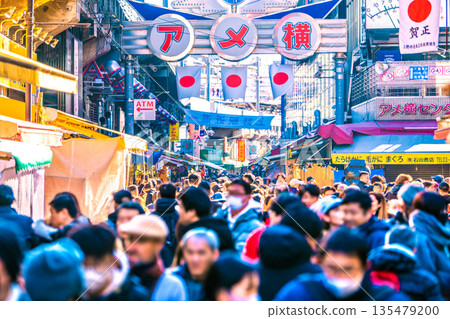 Tokyo cityscape in Japan during the New Year. Inbound tourism continues... It's like a "foreign country," with Ameyoko and other areas bustling with foreign tourists. Tokyo cityscape in Japan during the New Year. Inbound tourism continues... It's like a "foreign country," with Ameyoko and other areas bustling with foreign tourists. 135479200