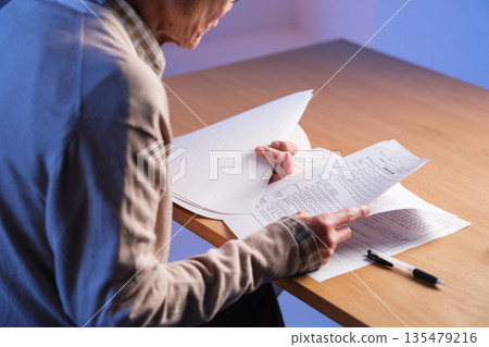 Senior man, end-of-life planning, at hand Senior man, end-of-life planning, at hand 135479216