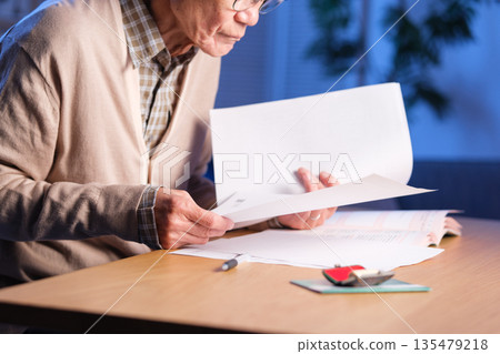 Senior man, end-of-life planning, at hand Senior man, end-of-life planning, at hand 135479218