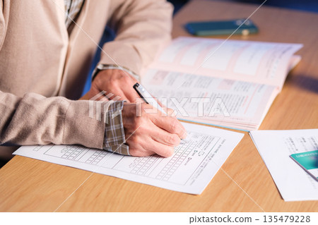 Senior man, end-of-life planning, at hand Senior man, end-of-life planning, at hand 135479228